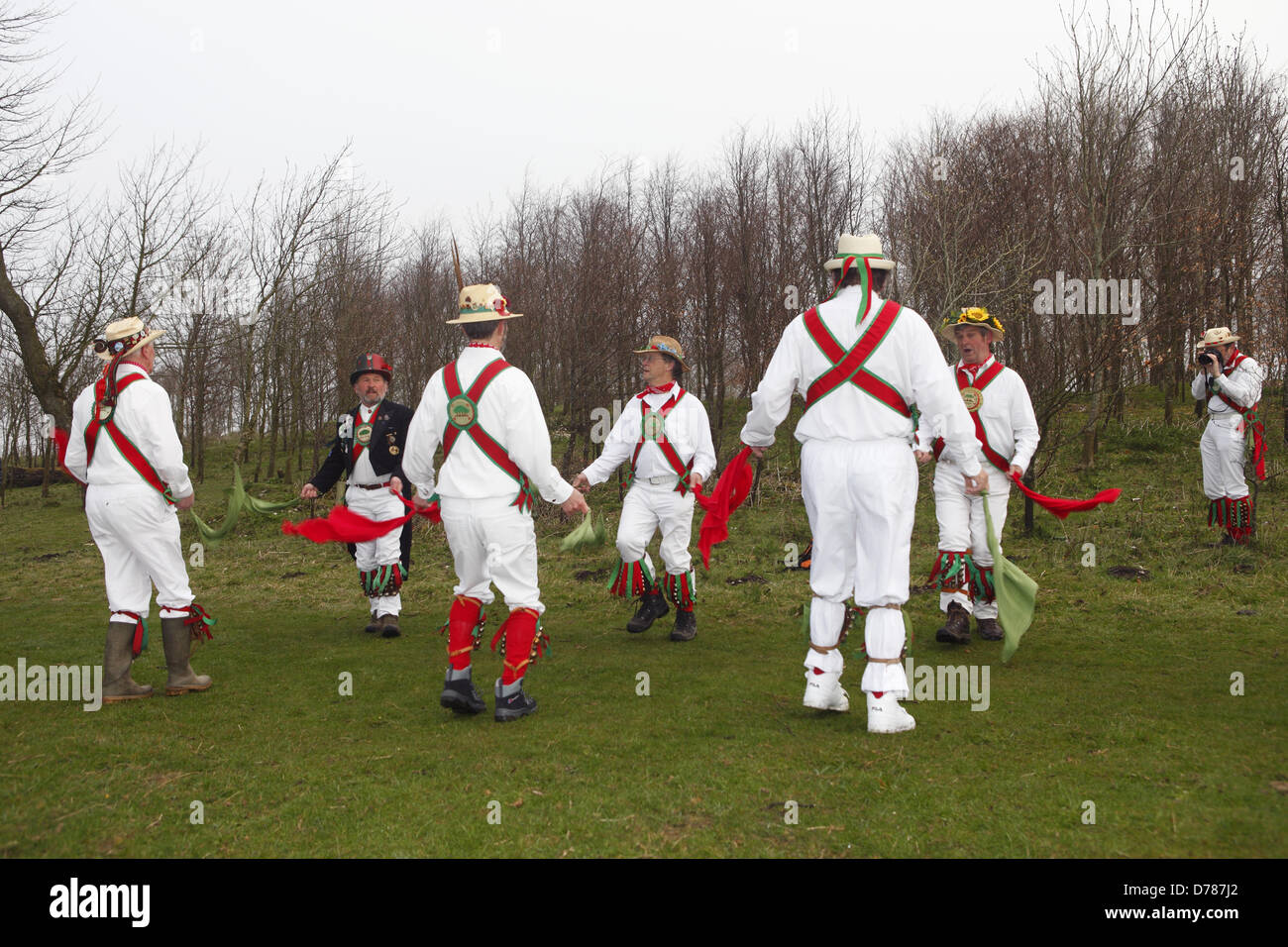 Chanctonbury Ring Morris Men celebrate May Day (1st May) with their traditional singing and dancing at Chanctonbury Ring, atop Chanctonbury Hill, East Sussex. Stock Photo