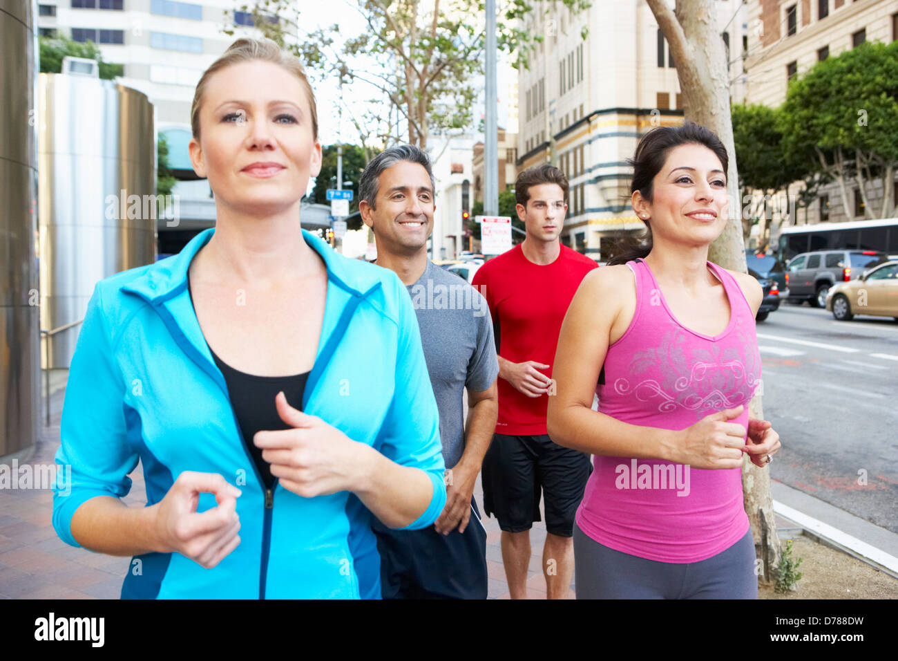 Group Of Runners On Urban Street Stock Photo