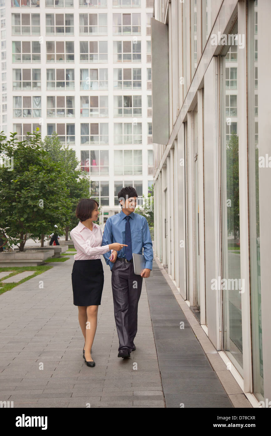 Professional women walking side view hi-res stock photography and ...