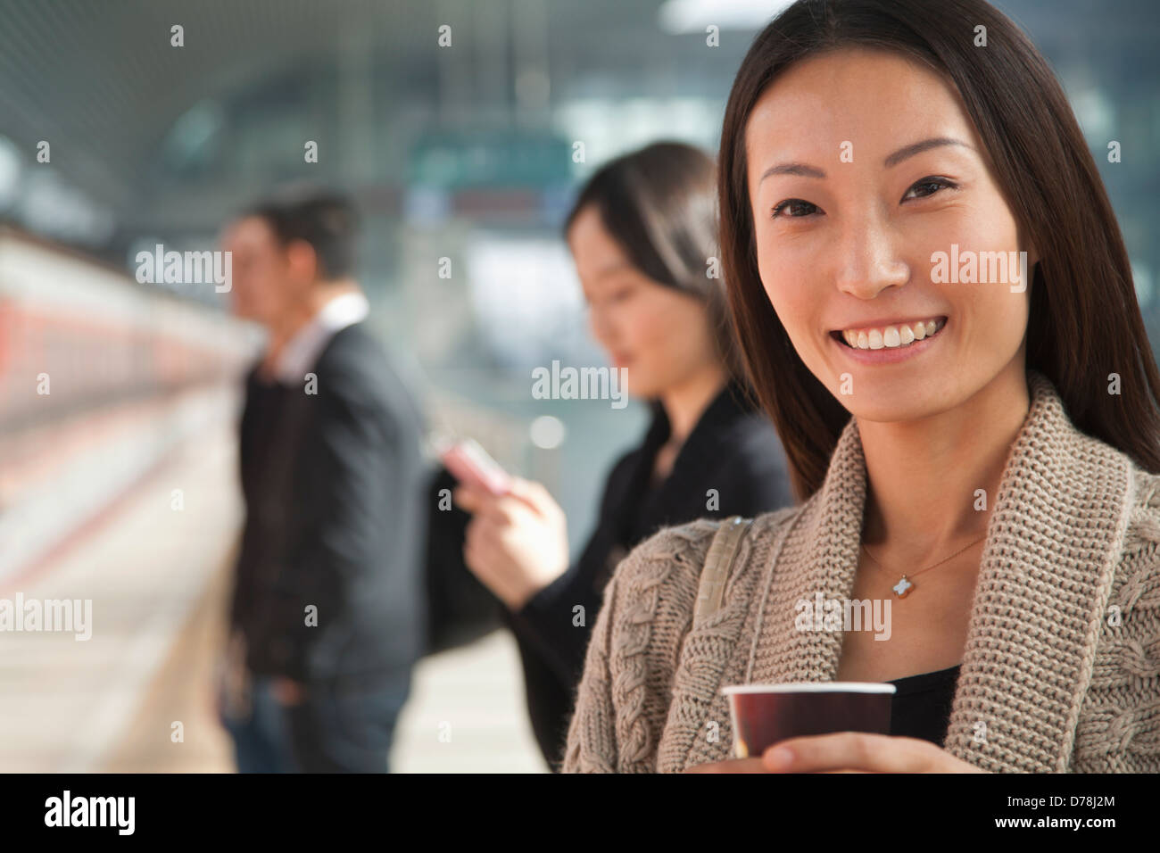 Waiting on train platform hi-res stock photography and images - Alamy