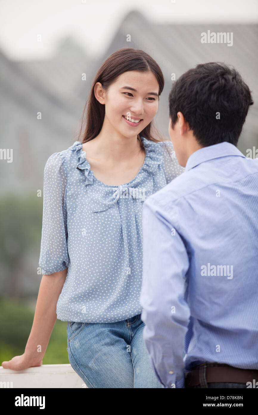 Young Couple on a Bridge Stock Photo - Alamy