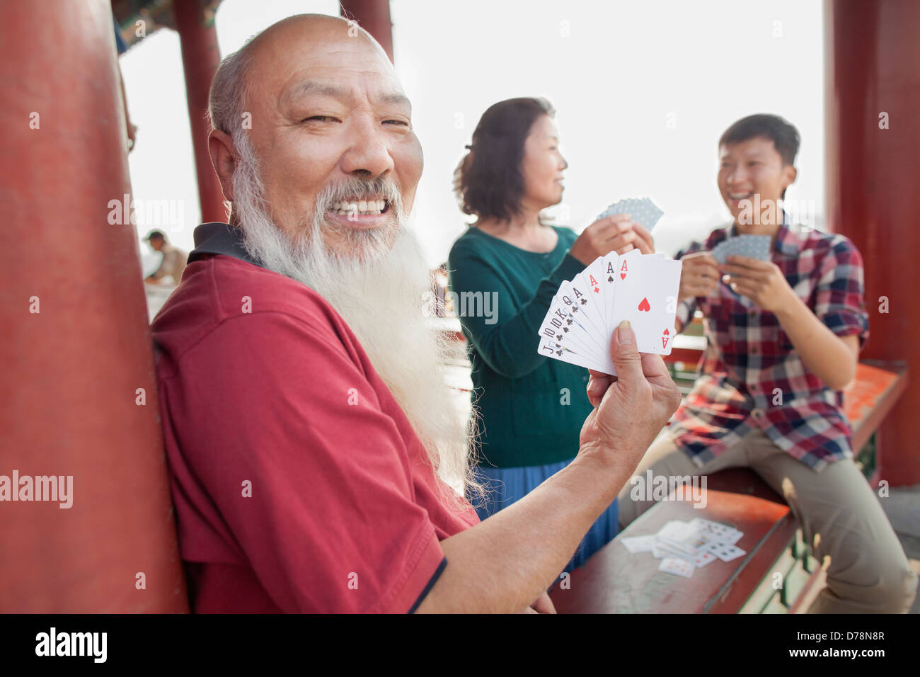 Chinese Family Playing Card In Jing Shan Park Stock Photo
