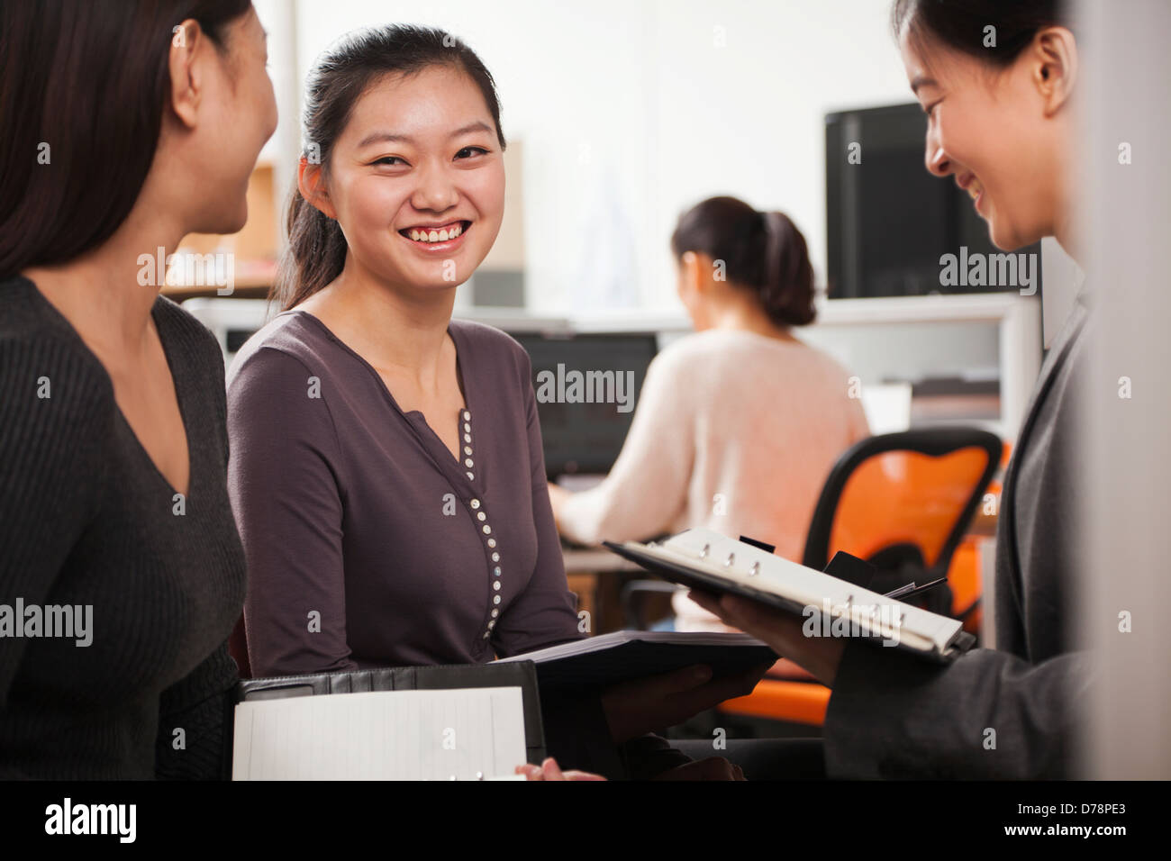Businesswomen having meeting in the office Stock Photo - Alamy
