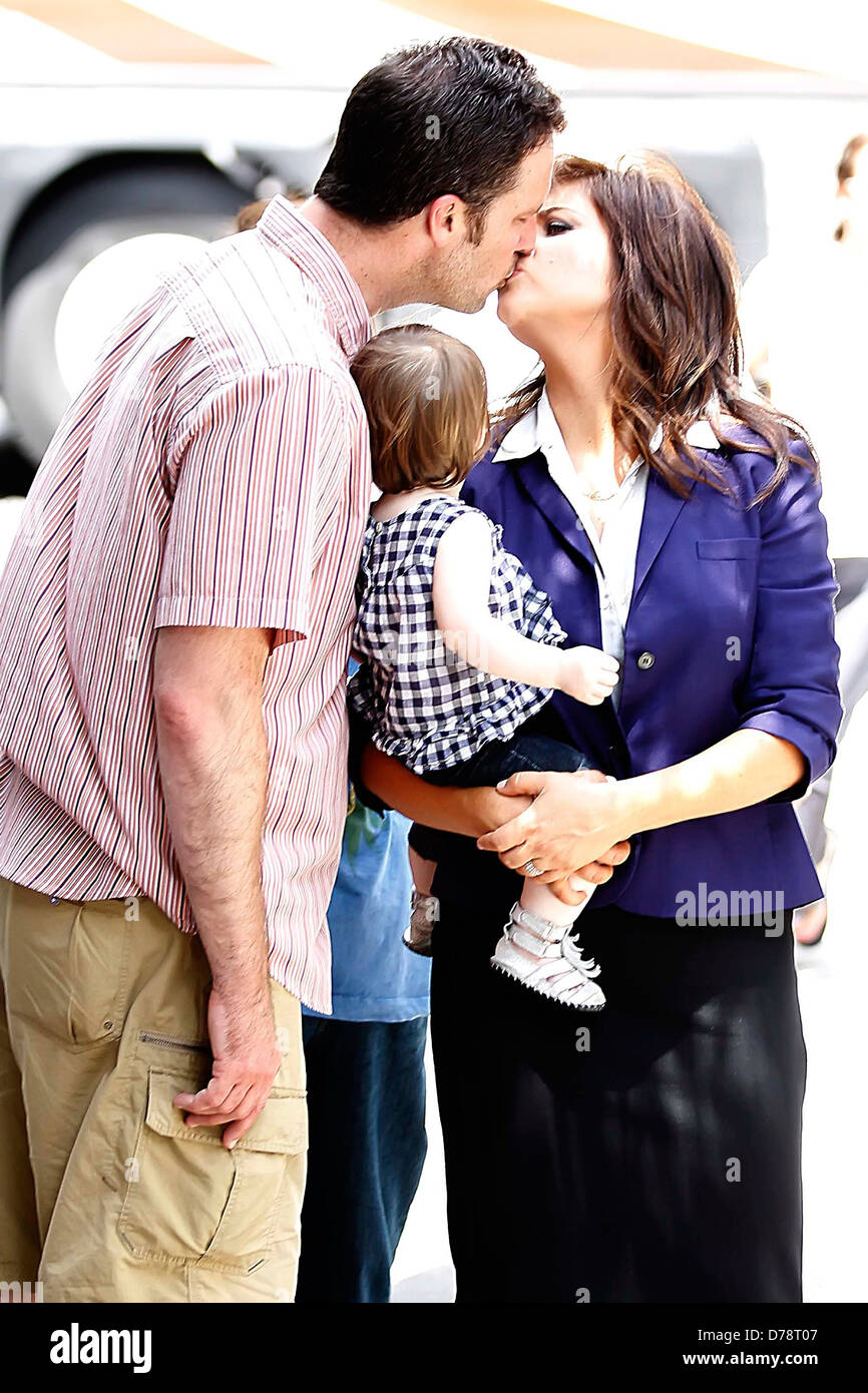 Brady Smith, Harper Smith and Tiffani Thiessen Tiffani Thiessen holding ...