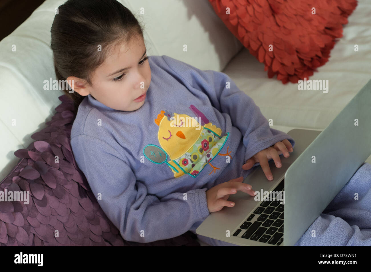 Child and laptop Stock Photo