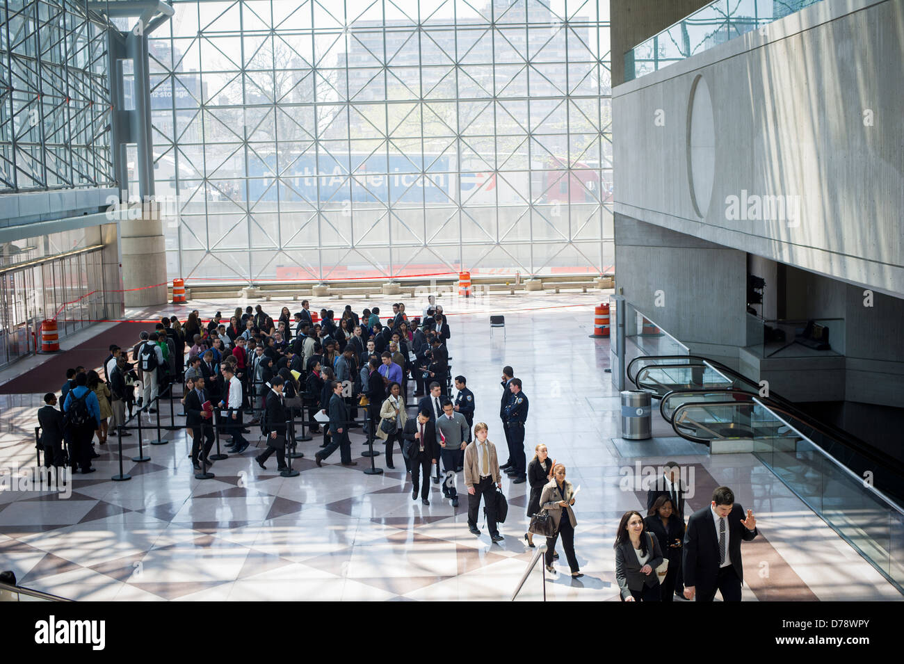 Job seekers attend the CUNY Big Apple Job and Internship Fair at the Jacob Javits Convention Center in New York Stock Photo