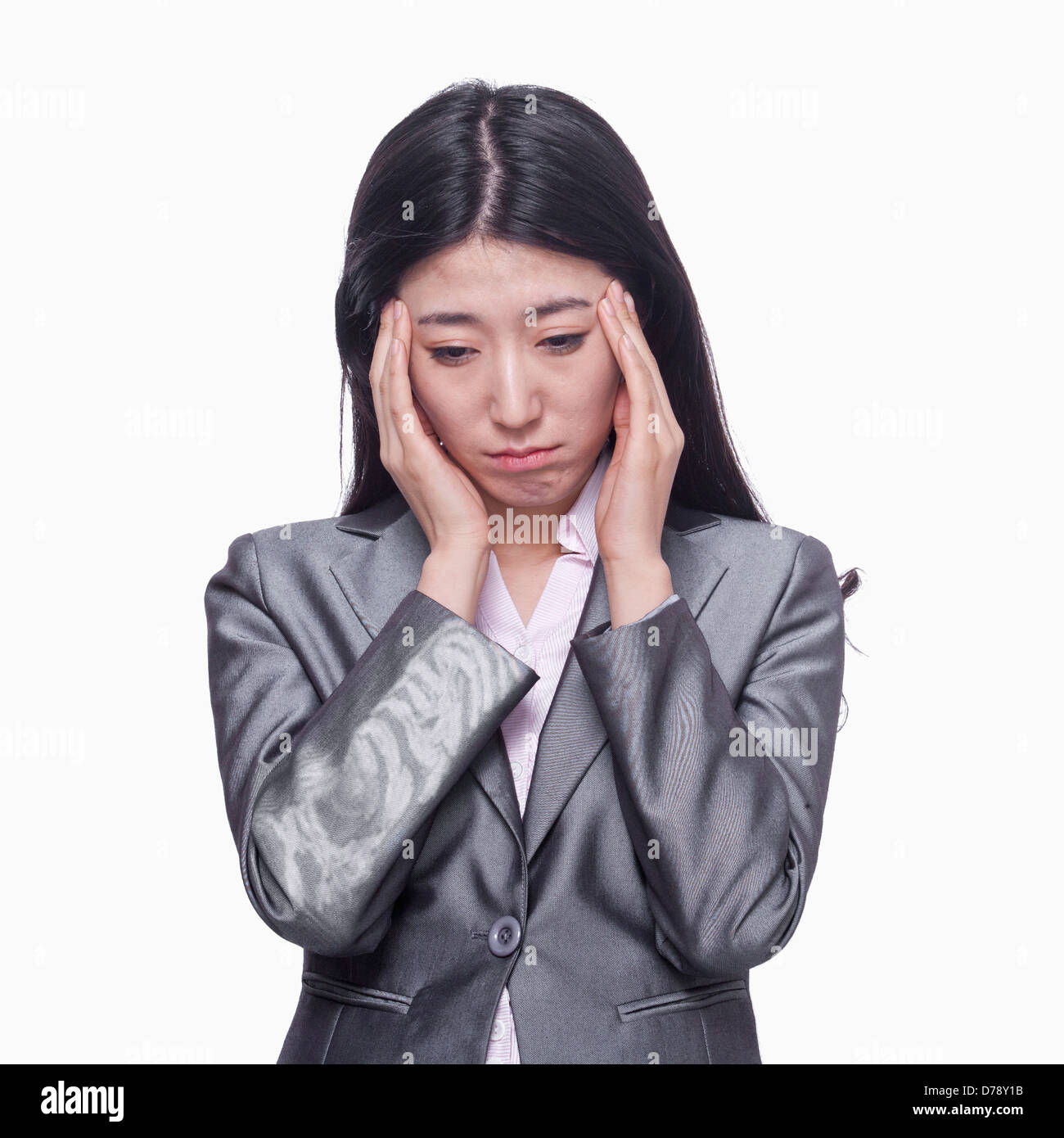 Businesswoman with tired expression Stock Photo