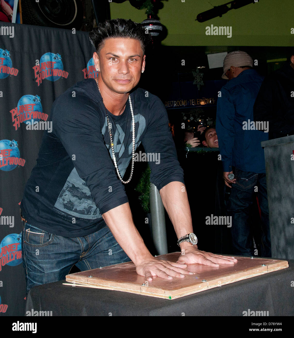 Pauly DelVecchio, aka Pauly D, takes part in a handprint ceremony at