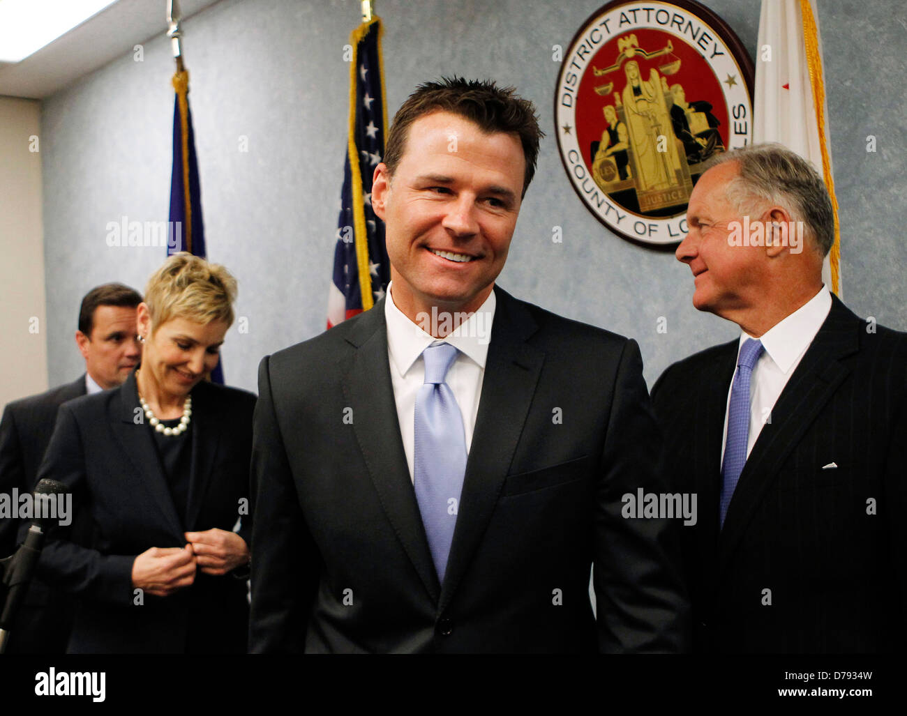 Deputy District Attorney David Walgren, center, and Deputy District Attorney Deborah Brazil, left, smile as they leave a press Stock Photo