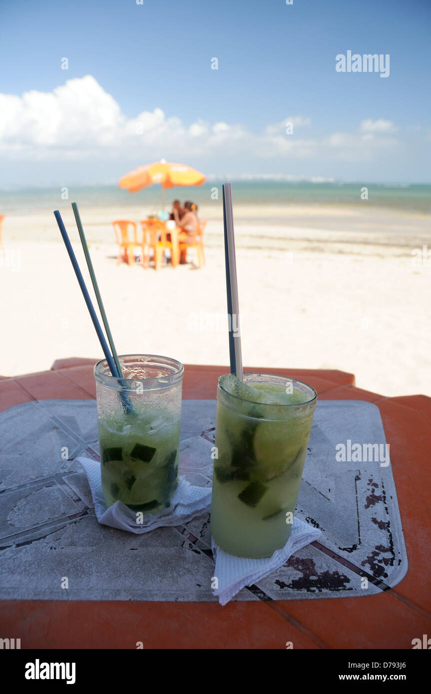Capirinhas at Beachside Cafe on Ilha de Itaparica with Salvador in Background Stock Photo