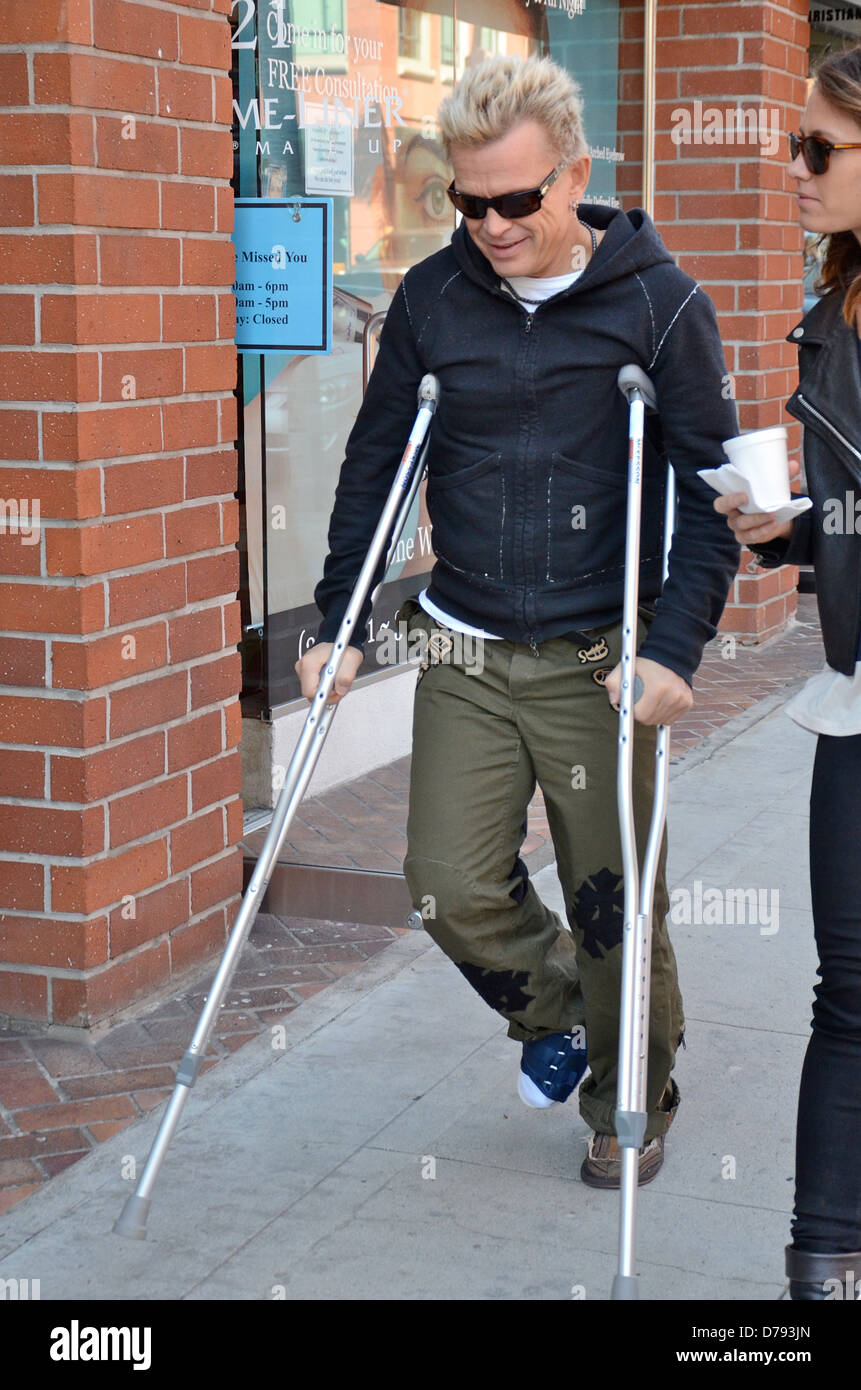 Billy Idol, real name William Broad, leaving a medical centre in Beverly Hills on crutches Los