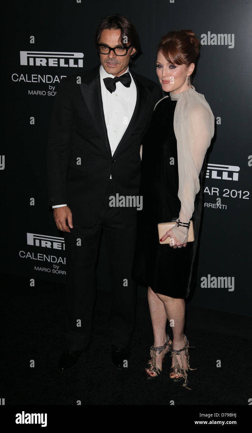 Mario Sorrenti and Julianne Moore The 2012 Pirelli Calendar gala dinner