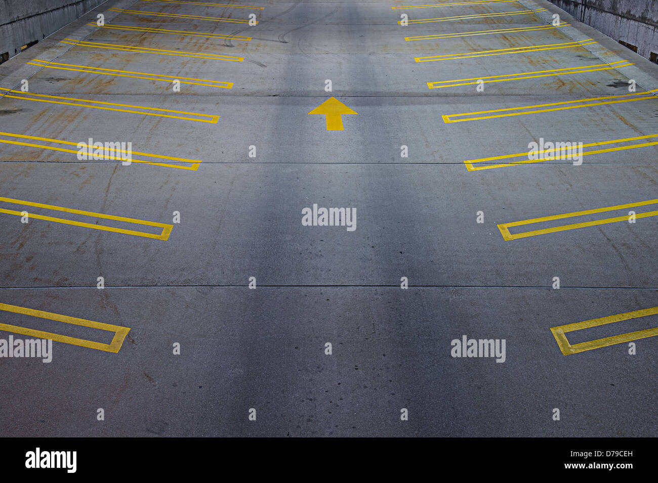 Empty Parking Lot With Arrow Stock Photo