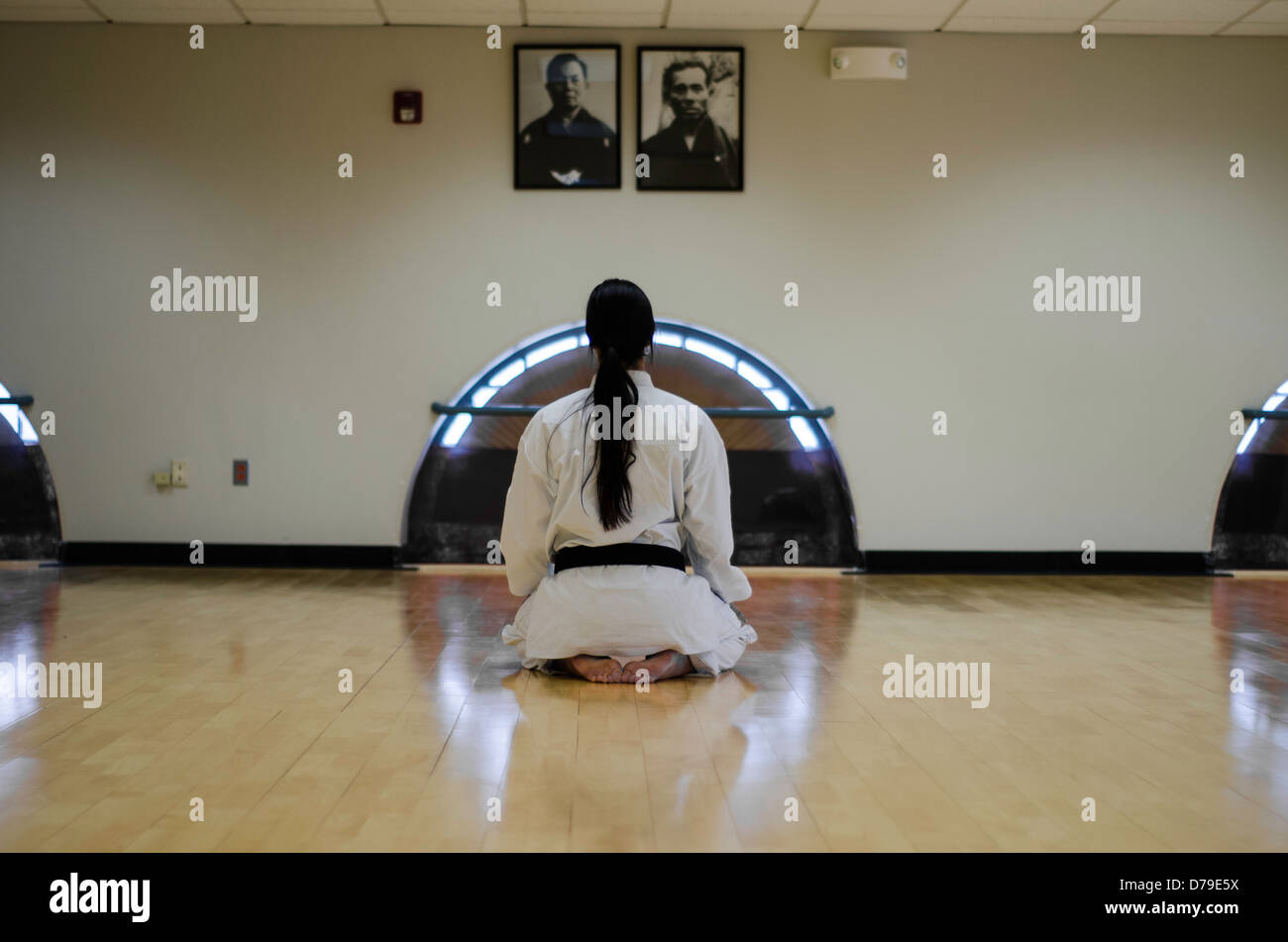 Martial Arts Dojo Kneeling Bow Stock Photo