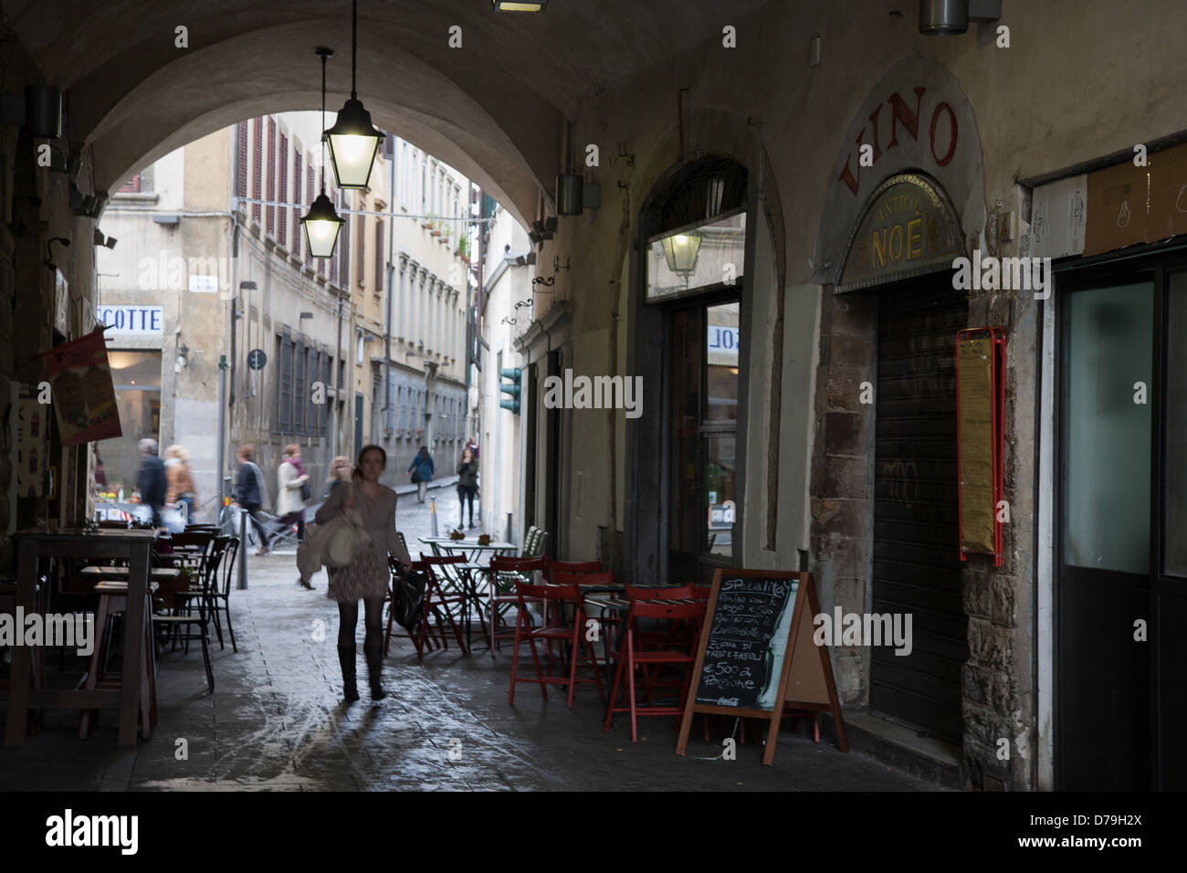 People Shopping in Volta di San Pietro Street, Florence, Italy Stock Photo