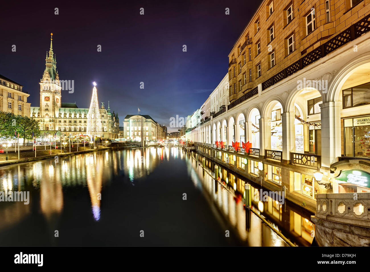 Hamburg city hall with Christmas fair and Alster arcades to the