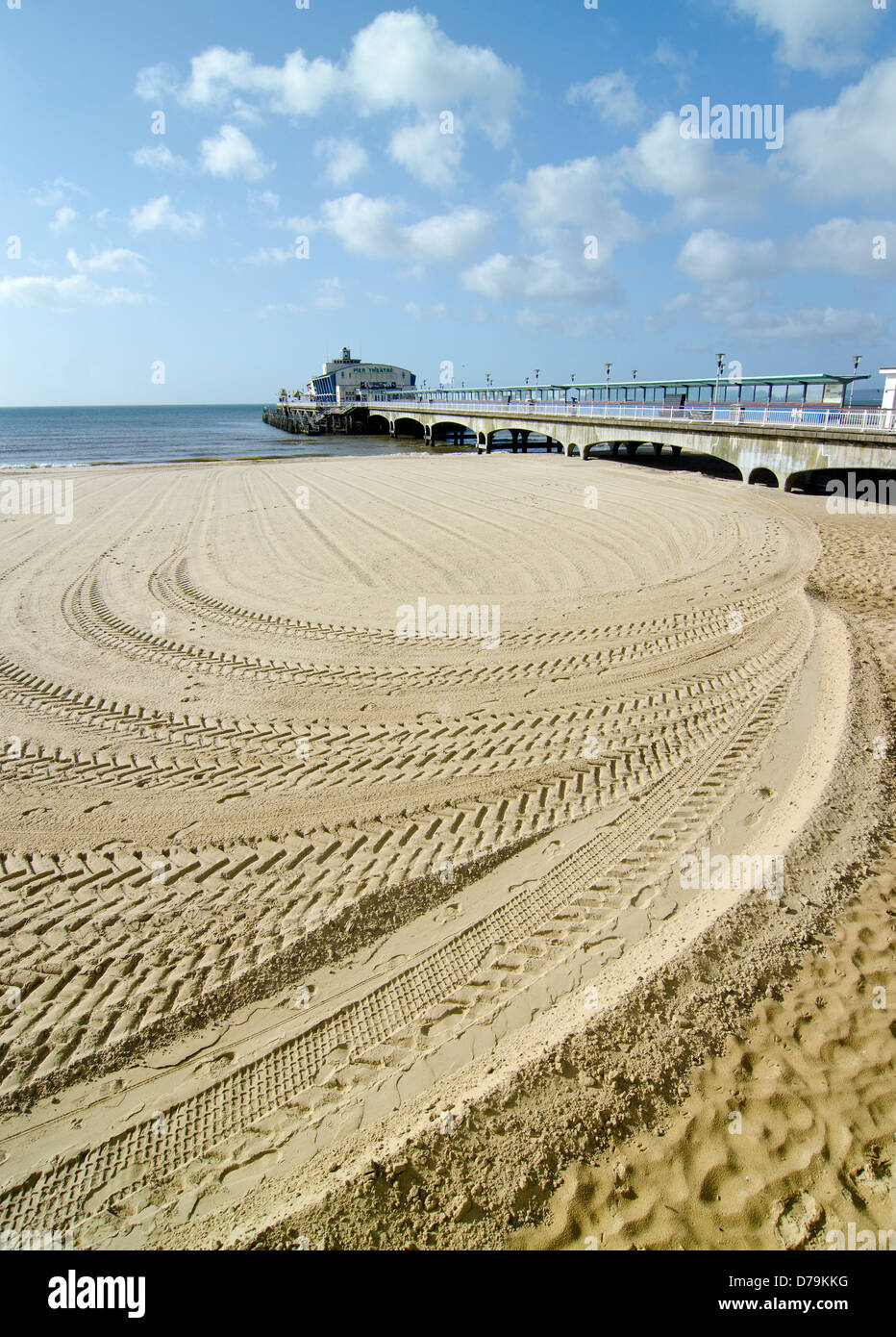 Tractor tyre marks in the sand Bournemouth UK Stock Photo