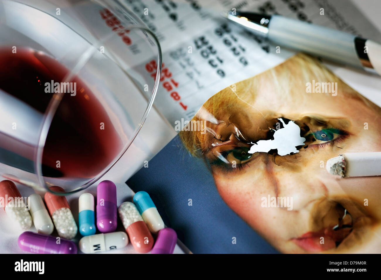 Burnt photo and tablets, borer out syndrome , Verbranntes Foto und Tabletten, Burnout-Syndrom Stock Photo