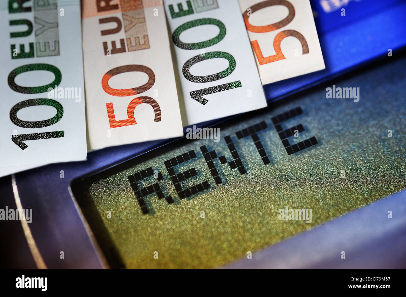 Pension stroke on a pocket calculator and bank notes , Rente-Schriftzug auf einem Taschenrechner und Geldscheine Stock Photo