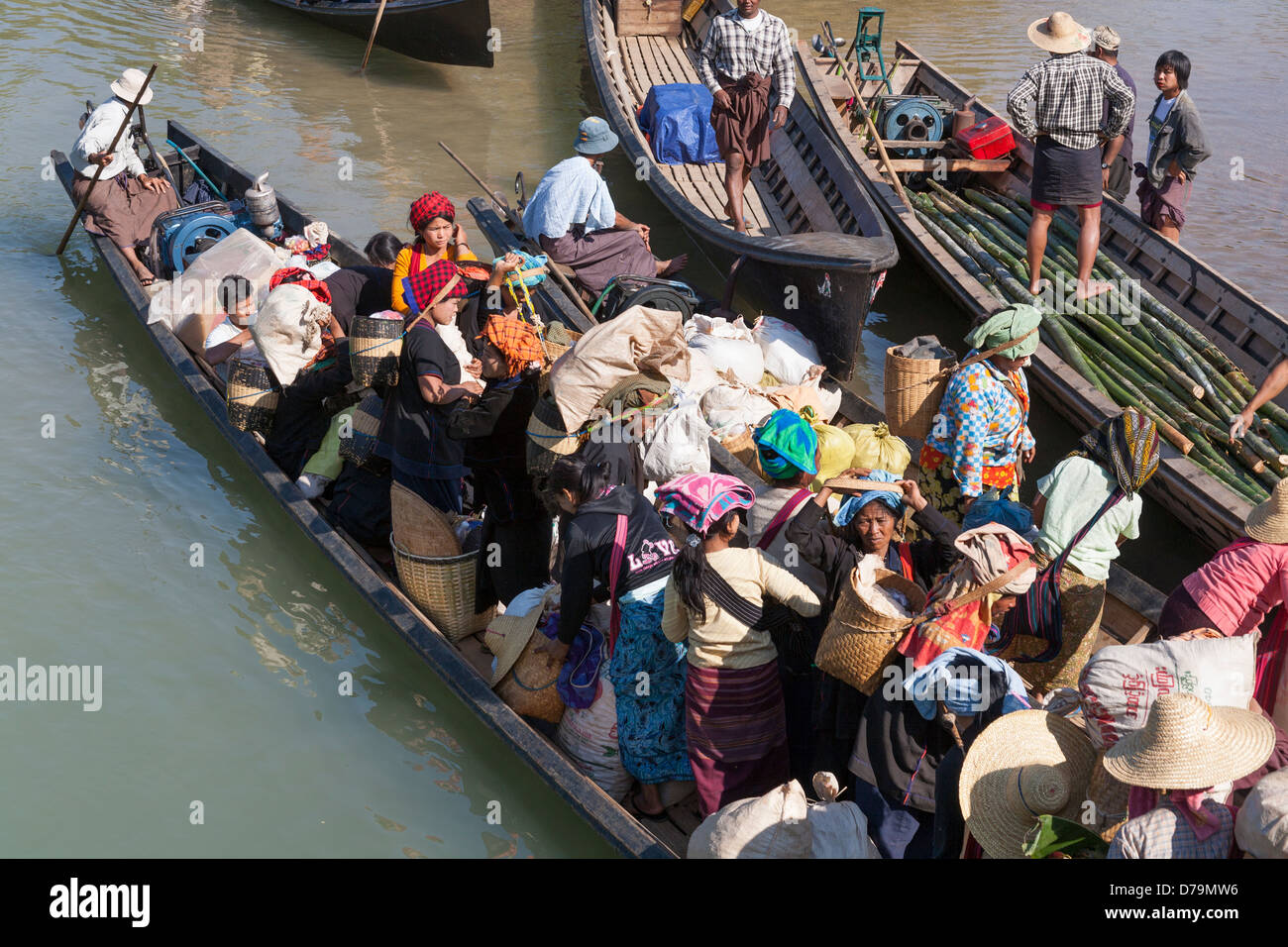 Villagers disembarking from a boat, Inle Lake, near Indein and Nyaung Ohak villages, Shan State, Myanmar, (Burma) Stock Photo