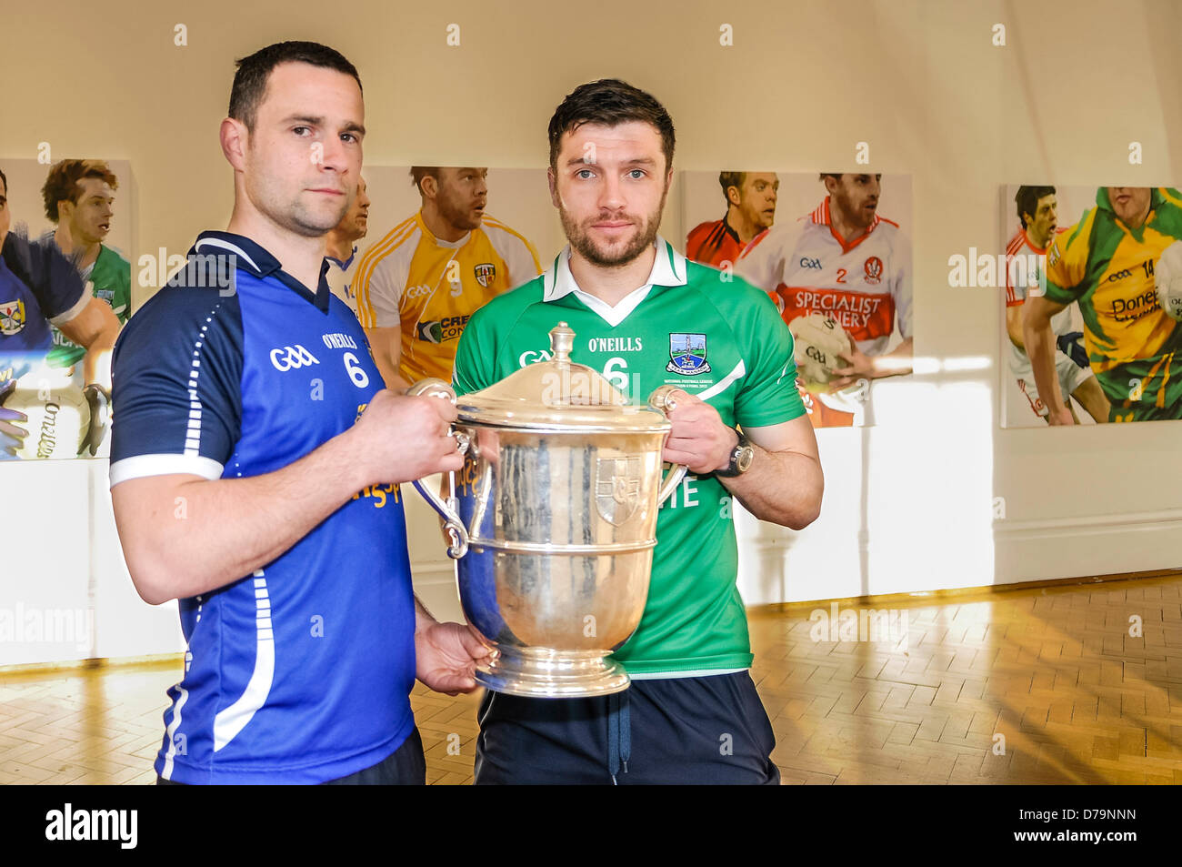 1st May 2013, Belfast, Northern Ireland.  Players from Cavan and Fermanagh county teams hold the Anglo-Celt cup as Ulster GAA launches the 2013 season Stock Photo