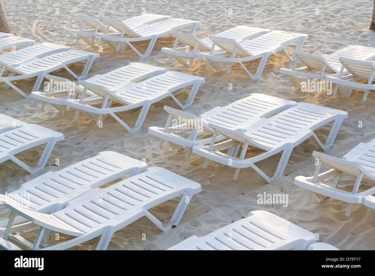 White pool chairs on the beach Stock Photo Alamy