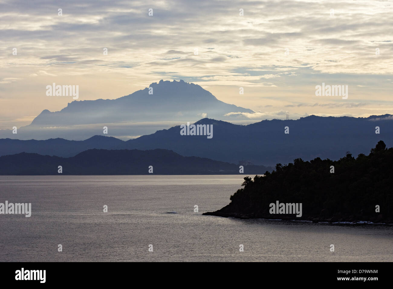 Mount Kinabalu Shrouded in Clouds Stock Photo - Alamy