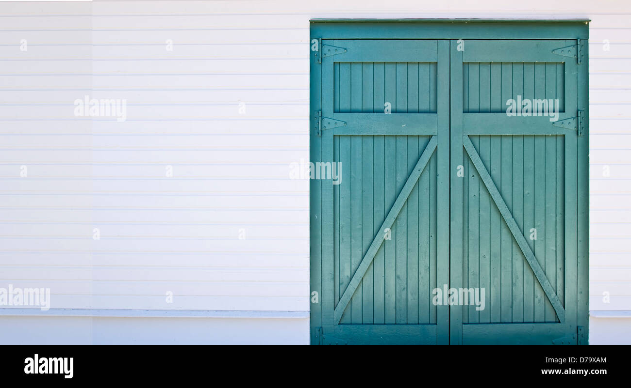 boat house with lap siding, green and white,panoramic,background image