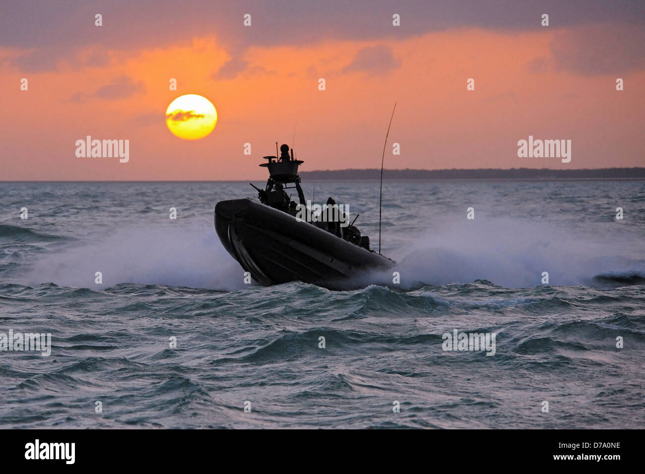 Special Boat Team 20 Navigates Rigid-Hull Inflatable Boat Stock Photo