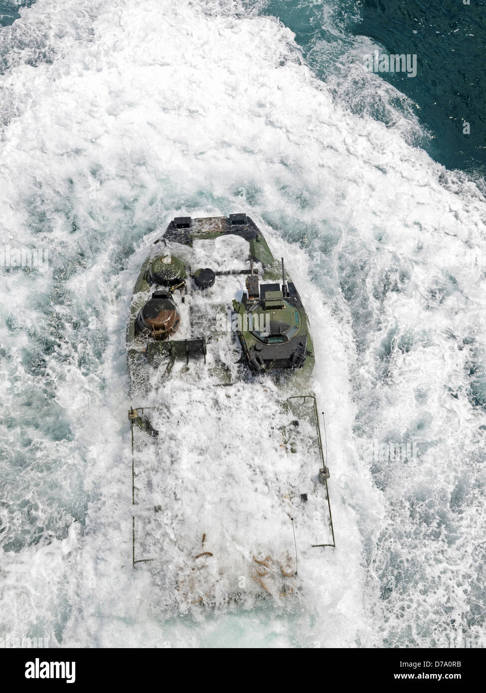 Amphibious Assault Vehicle Departs Well Deck USS Iwo Jima Stock Photo