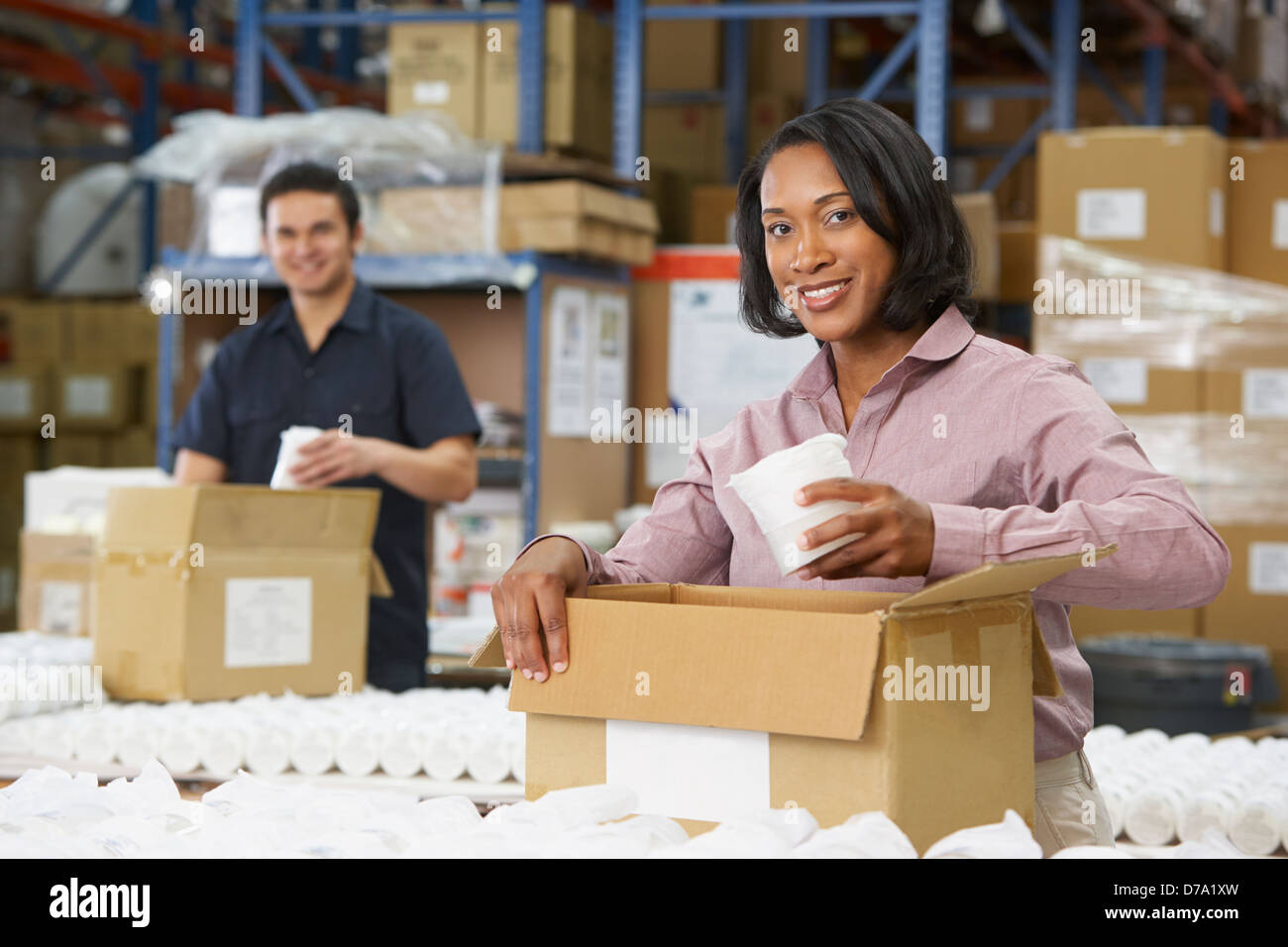 Manager Checking Goods On Production Line Stock Photo