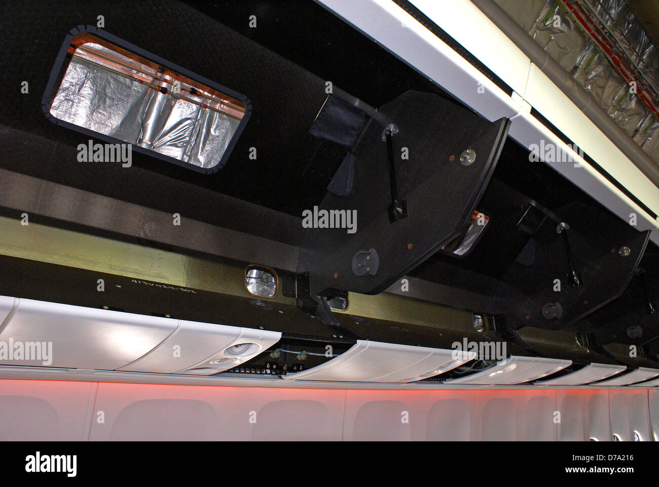 Carbon composite luggage bins in Boeing 7478 test aircraft Stock Photo