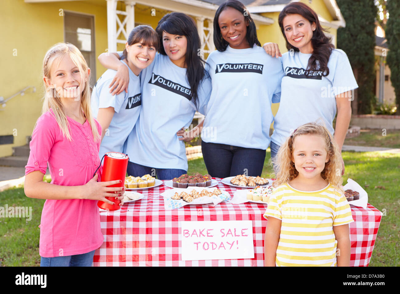 Women And Children Running Charity Bake Sale Stock Photo
