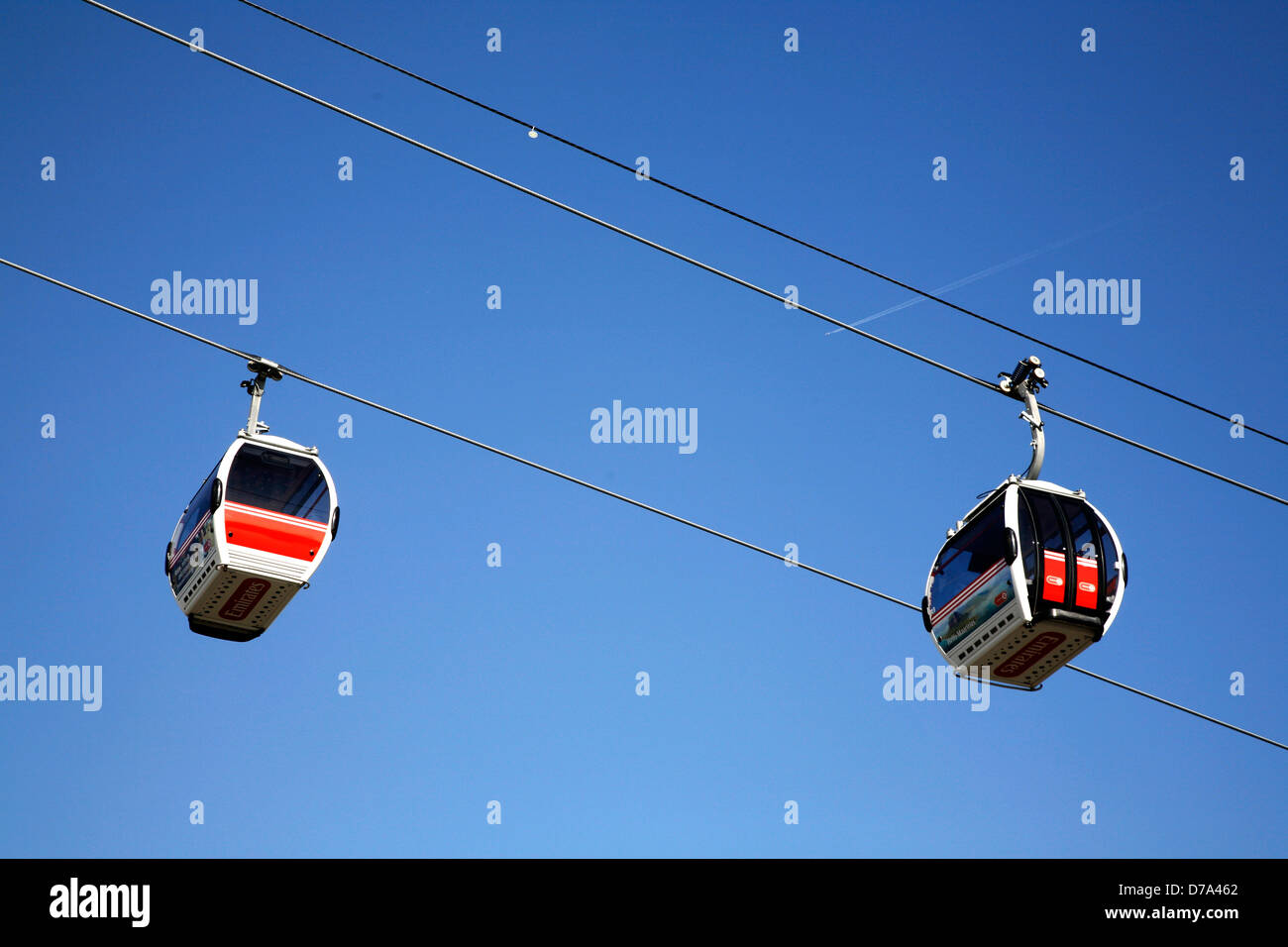 Cable cars from the Emirates Airline crossing over Royal Victoria Dock