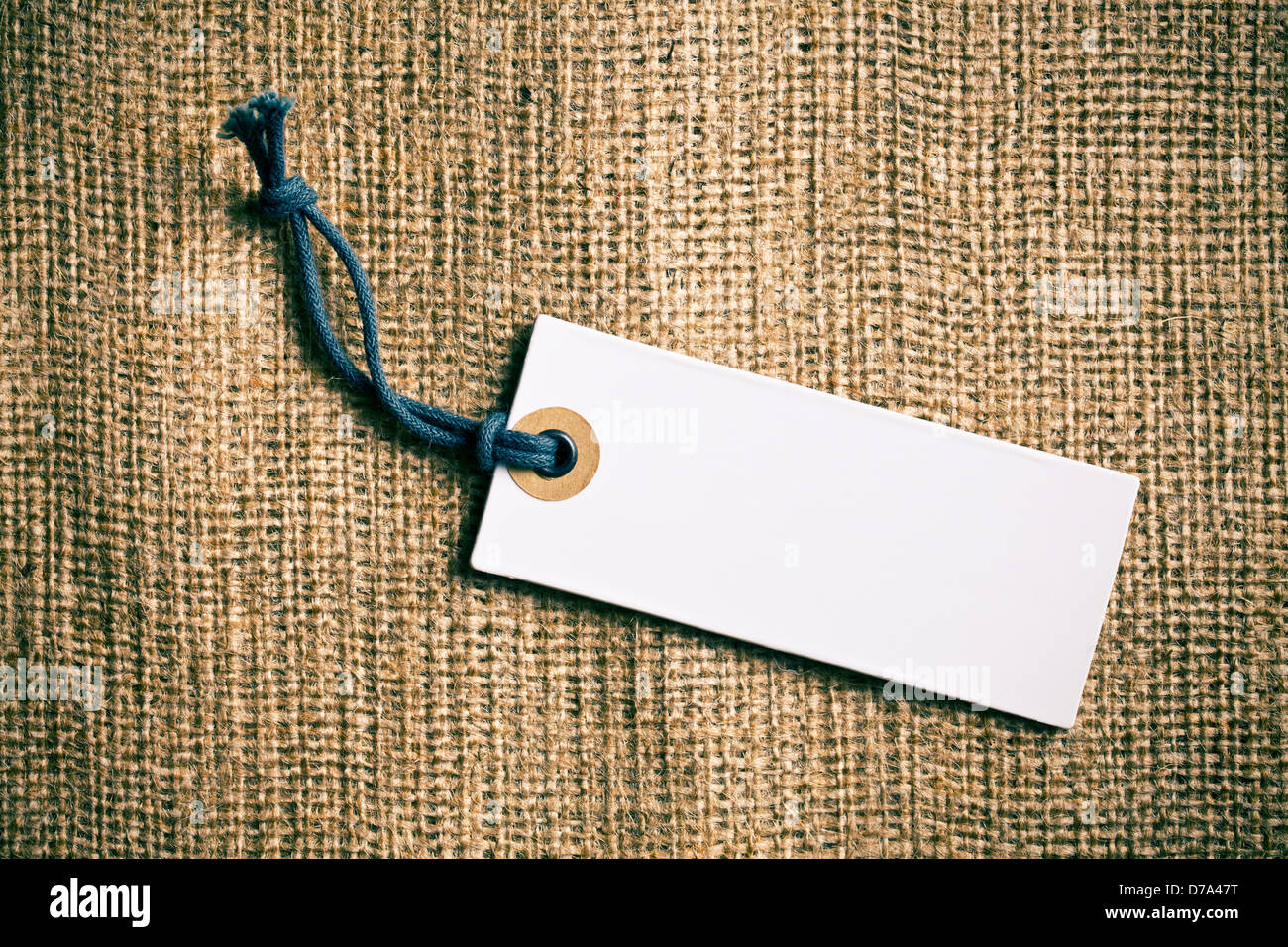 the blank price tag label on wooden background Stock Photo - Alamy