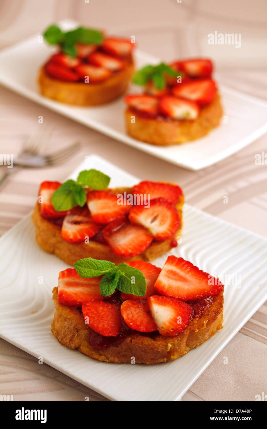Torrijas with strawberries (typical Spanish meal). Recipe available