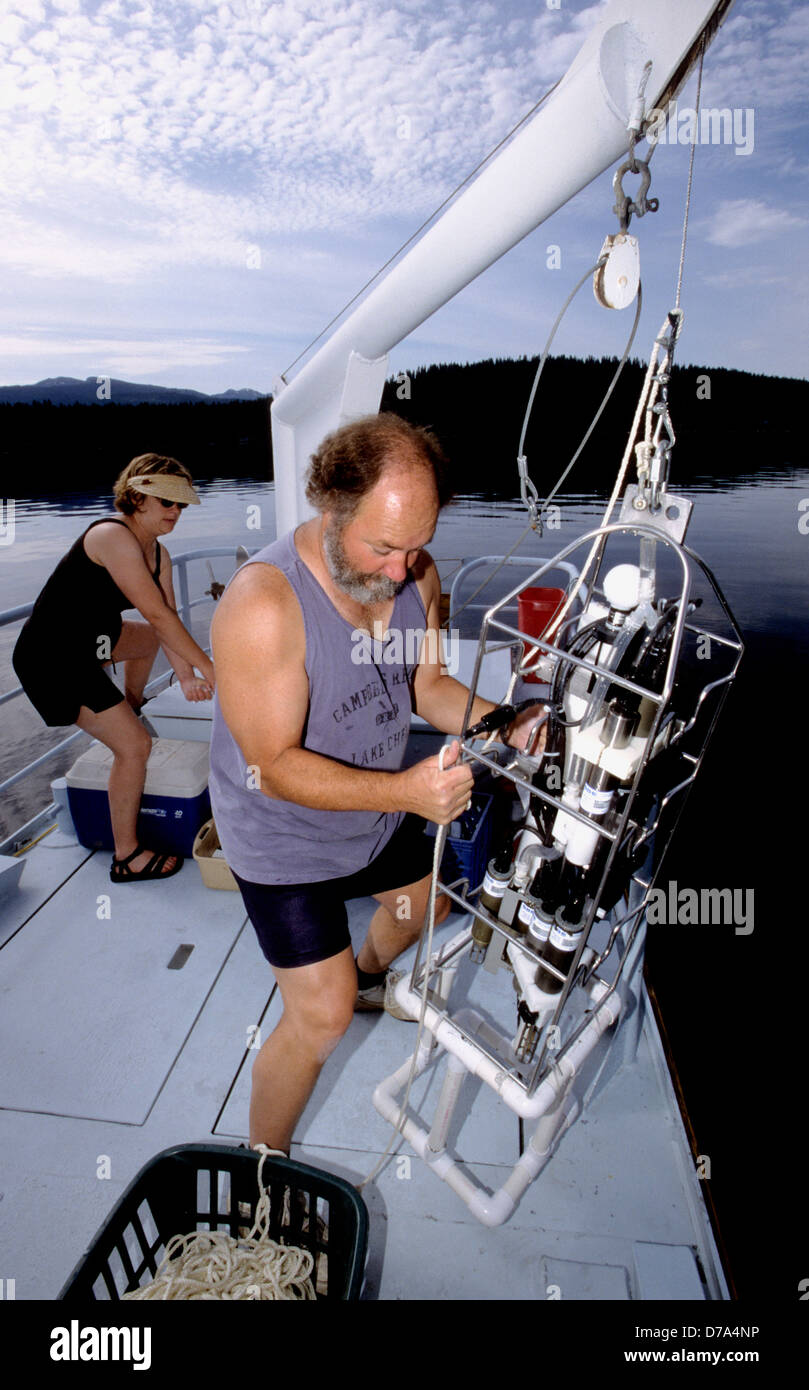 USGS limnologist deploying a multi-parameter water column profiler in Payette Lake in west-central Idaho. Stock Photo