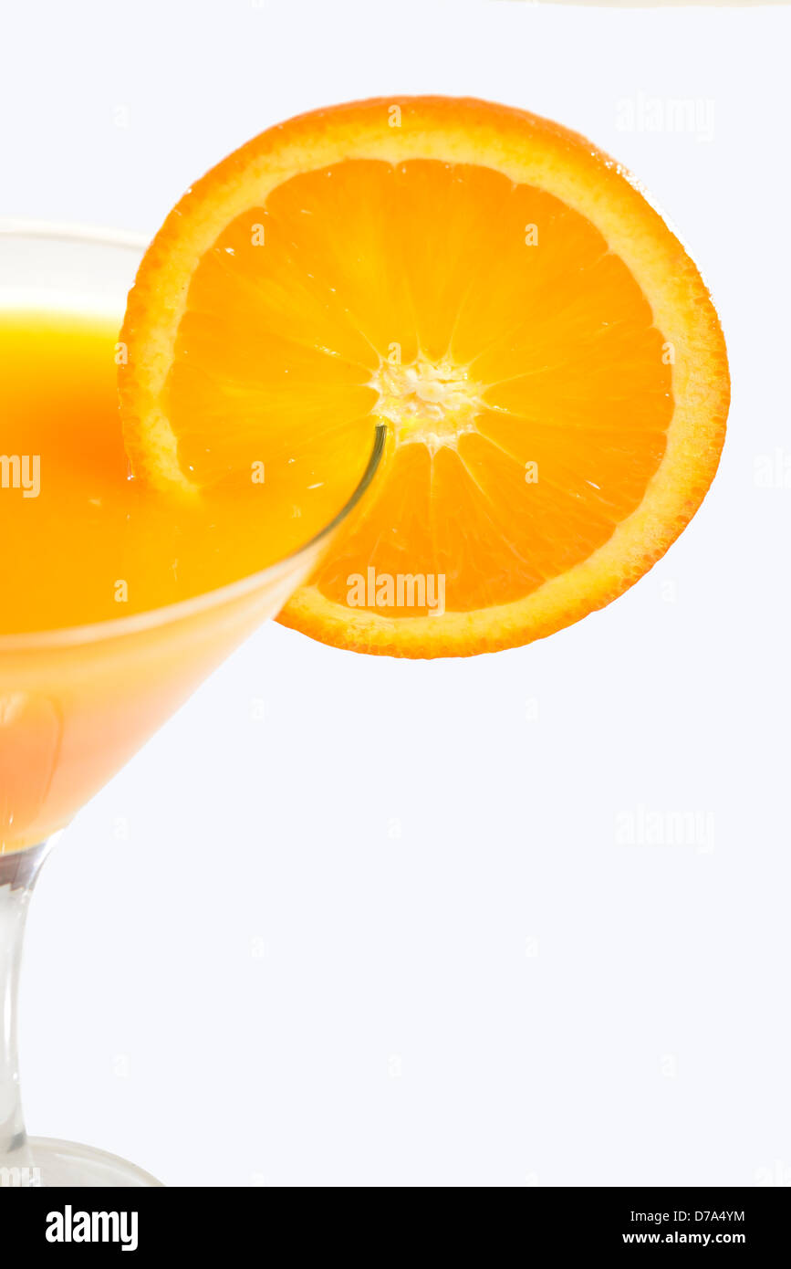 Orange juice and Orange slice in Cóctel vessel Stock Photo