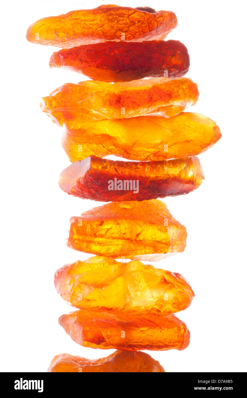 The raw amber on white background isolated Stock Photo - Alamy