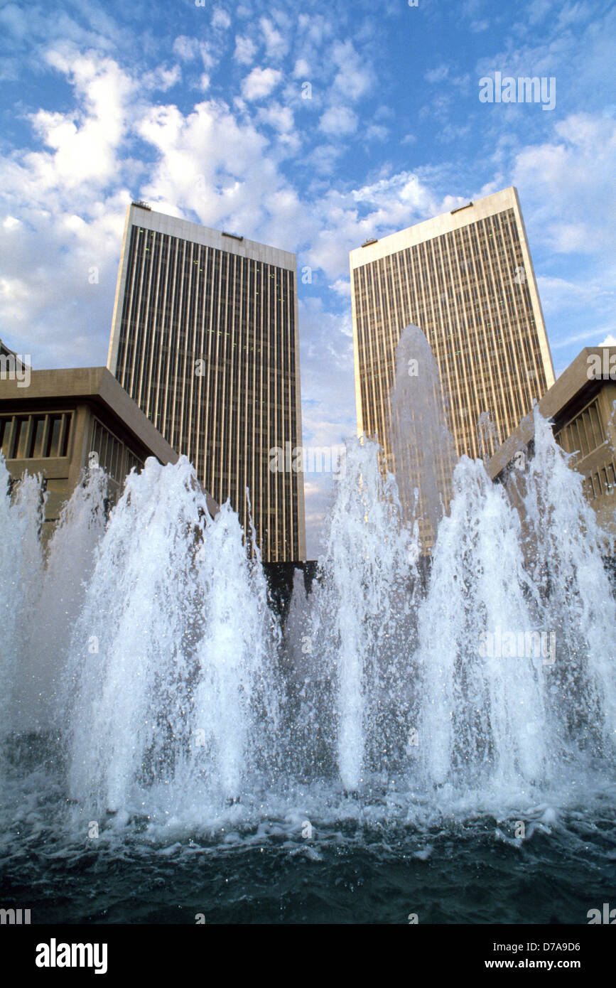 Water fountains play in front of the twin 44-story Century Plaza Towers  in the business district of Century City in Los Angeles, California, USA. Stock Photo