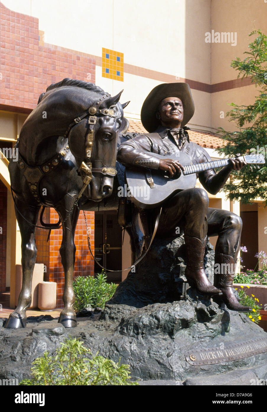 A bronze sculpture of actor/singer Gene Autry and his horse is displayed at the Autry Museum of the American West in Los Angeles, California, USA. Stock Photo
