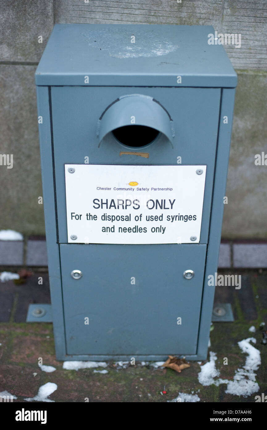 Sharps Only Disposal used syringes and needles bin Stock Photo Alamy