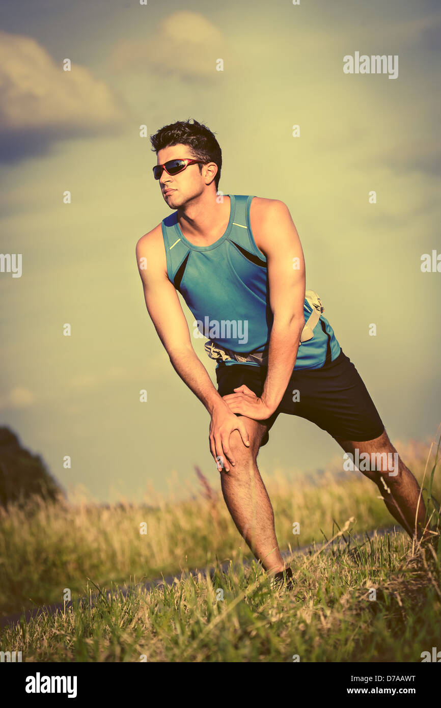Man stretching hi-res stock photography and images - Alamy