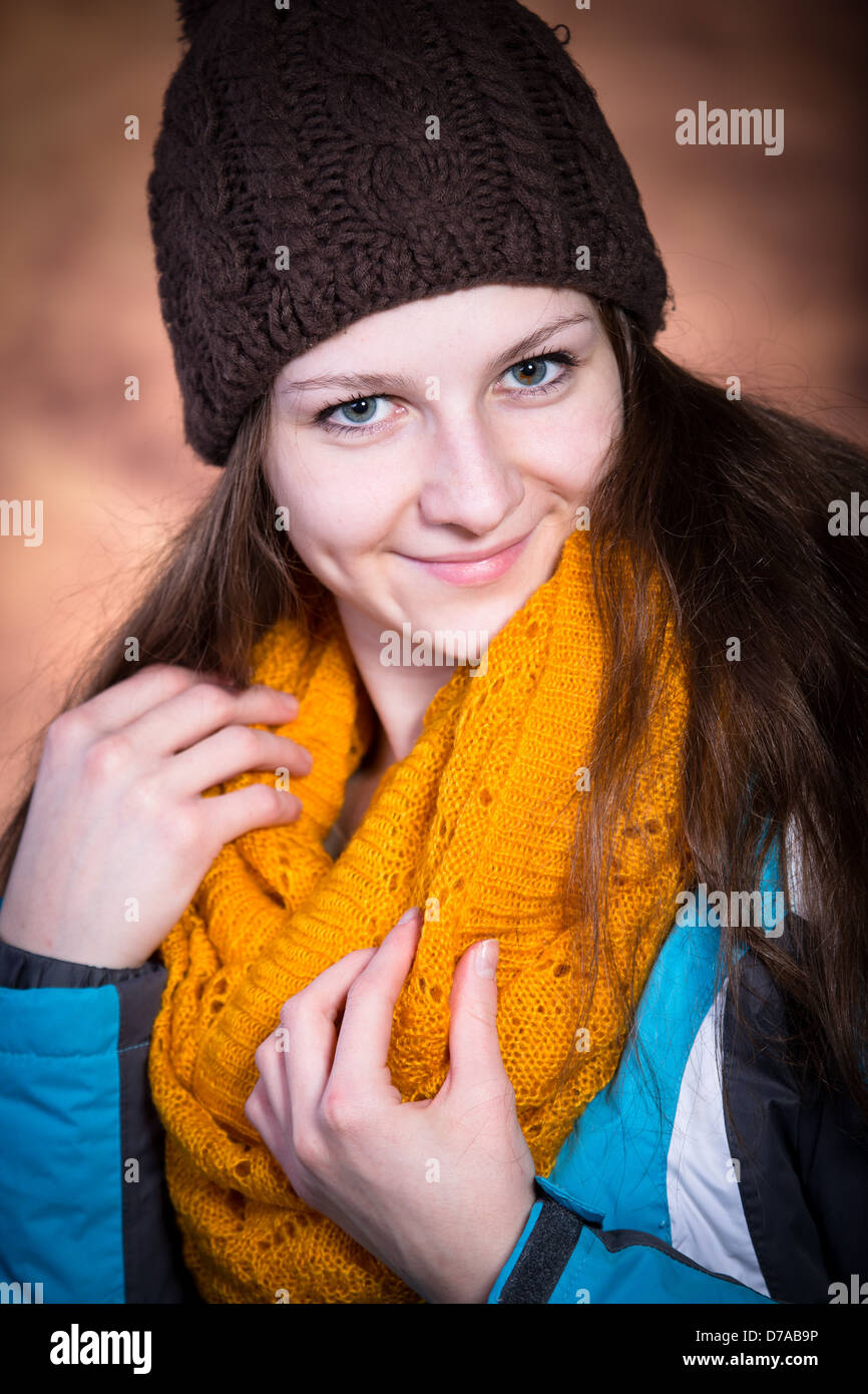 studio portrait of a teenage girl with woollen clothes Stock Photo