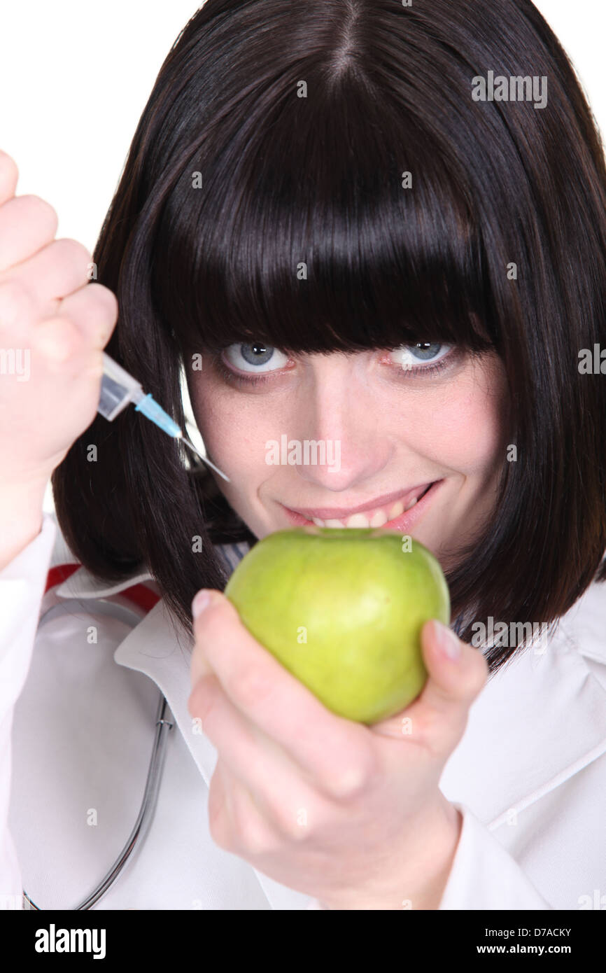 Nurse using syringe Stock Photo