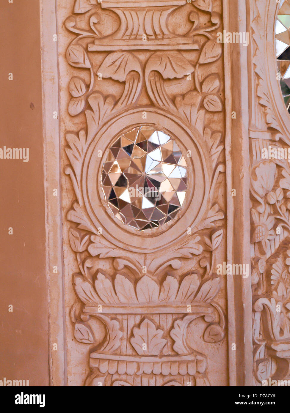 Closeup Of White Stucco And Mirror Decoration In The