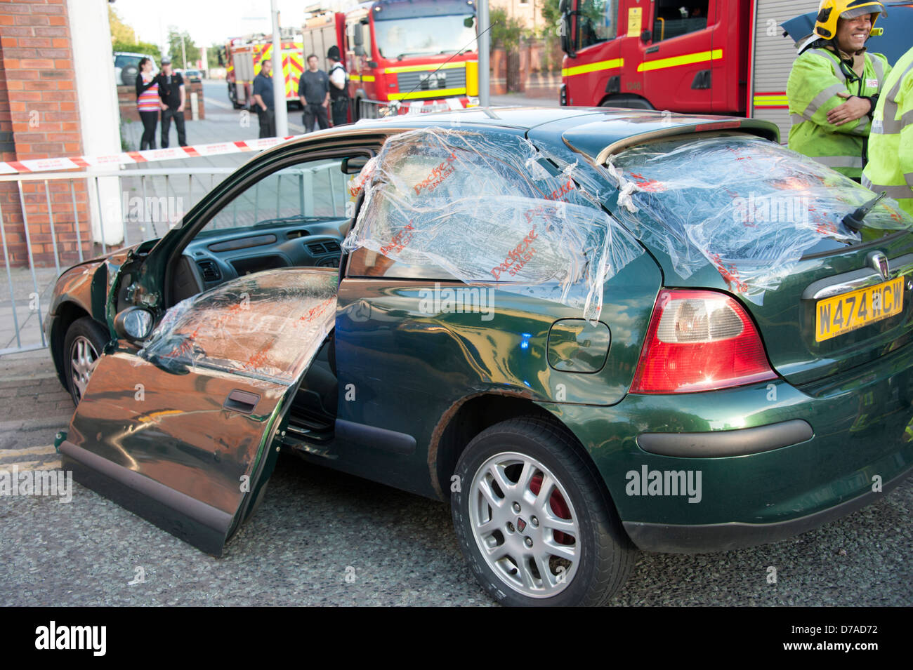 Car crash door cut off fire & Rescue Extrication Stock Photo - Alamy