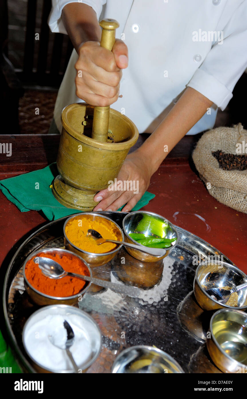 Chef using mortar and pestle for grinding spices Stock Photo Alamy