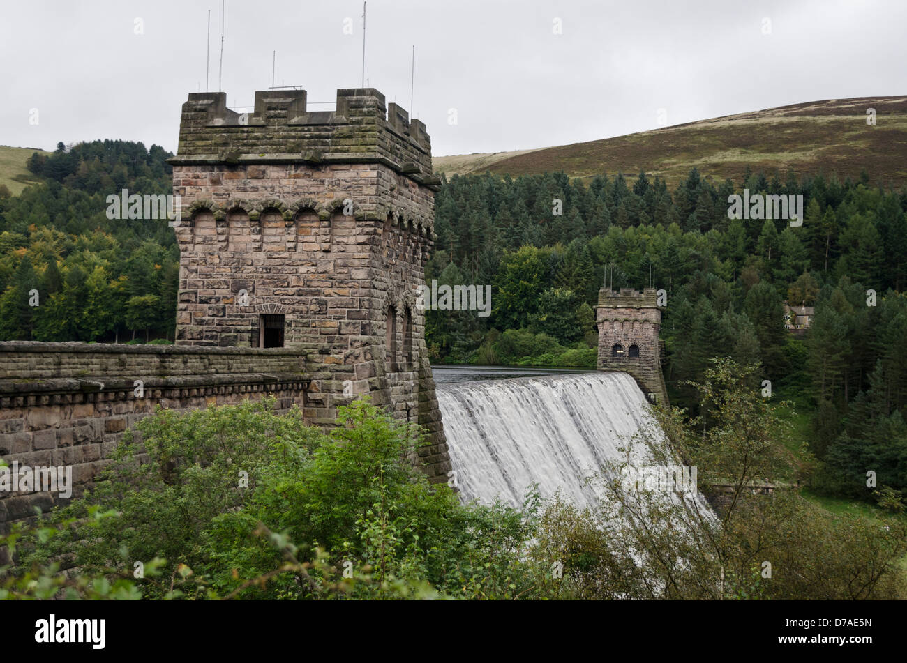 Looking across the Derwent Dam wall, with the reservoir over flowing Stock Photo