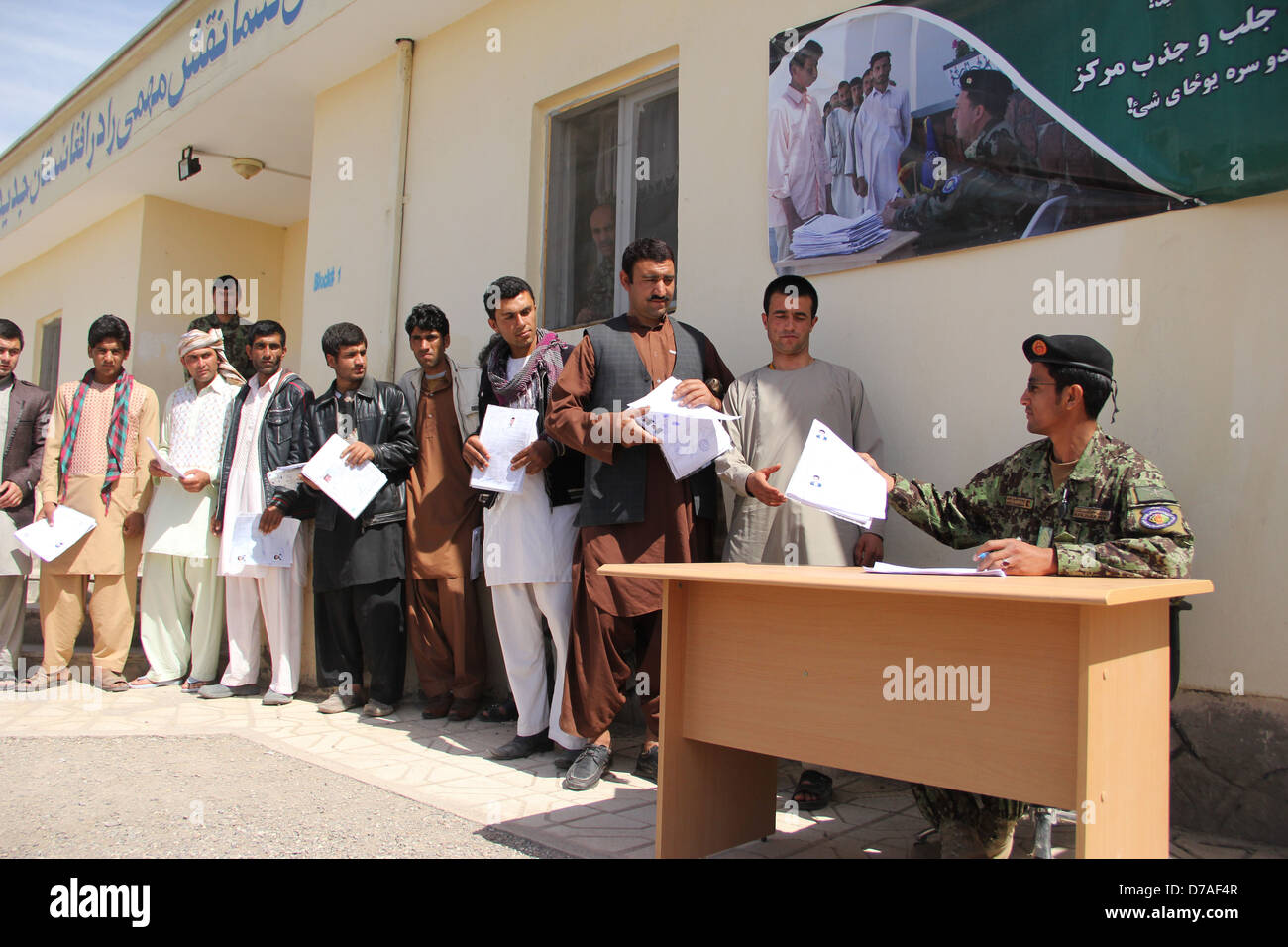 Afghan youth that get registered form from the Afghan National Army Recruitment center in Herat Stock Photo
